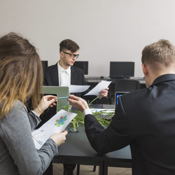 group-businesspeople-working-graph-office